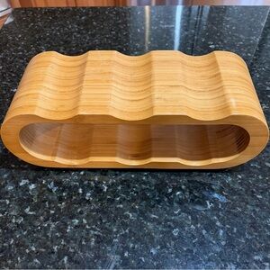 Six-bottle handcarved bamboo wine rack with pedestal bars